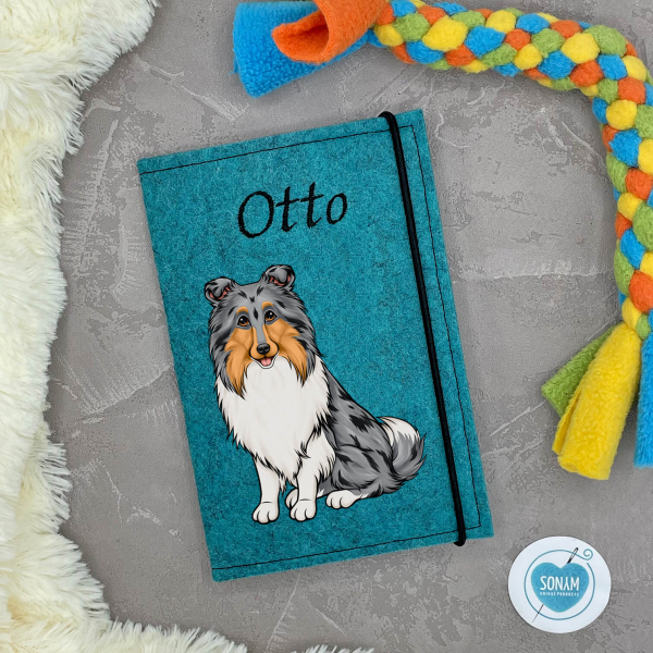 Designbeispiel der Impfpasshülle türkis meliert für die Hunderasse Collie Langhaar blue merle